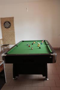 a pool table with balls on top of it at Penzion Hodky in Světlá pod Ještědem
