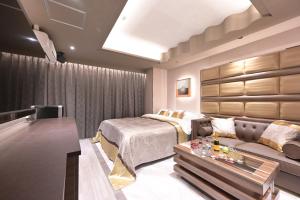 Ruang duduk di Hotel Pasadena 食べ放題飲み放題 - Couple Hotel