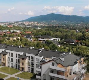 an aerial view of a city with houses at Dwupiętrowy Apartament Beskid View in Bielsko-Biała