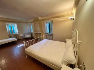 Postel nebo postele na pokoji v ubytování Borgo BiancoMatilde - Locanda