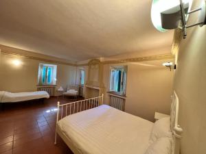 Postel nebo postele na pokoji v ubytování Borgo BiancoMatilde - Locanda