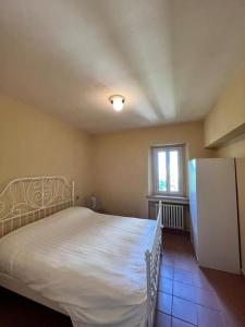 Postel nebo postele na pokoji v ubytování Borgo BiancoMatilde - Locanda