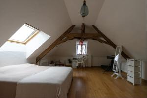 מיטה או מיטות בחדר ב-#Villa ChezGuite - Atypique - Spacieuse - Lumineuse