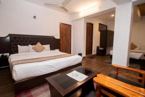 Tempat tidur dalam kamar di Tiara Regency Gangtok