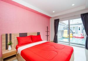 Postel nebo postele na pokoji v ubytování AJ Pool Villa Hua-Hin