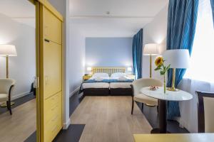 Ένα ή περισσότερα κρεβάτια σε δωμάτιο στο Hotel Lido Seegarten