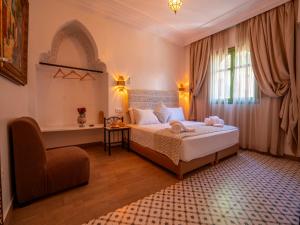 Postel nebo postele na pokoji v ubytování Riad Dar Sido + 30 fotografií