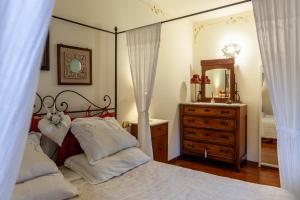 Postel nebo postele na pokoji v ubytování La Casa Dei Gerani