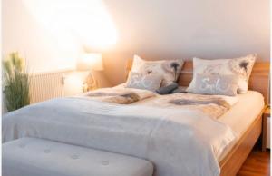 Postel nebo postele na pokoji v ubytování Ferienwohnung Prestige 1