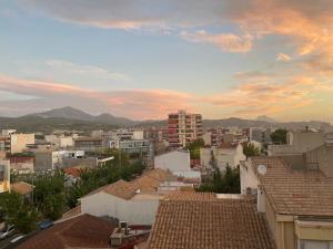 a view of a city with buildings and mountains at El Campello Mountain View in El Campello