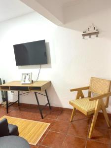 TV a/nebo společenská místnost v ubytování Edificio LENOA