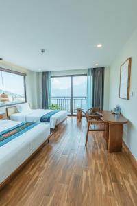 Postel nebo postele na pokoji v ubytování Sapa Yen Hotel