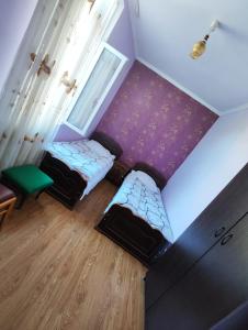 Llit o llits en una habitació de Chveni Ezo