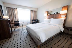Voodi või voodid majutusasutuse Radisson Blu Conference Hotel, Düsseldorf toas