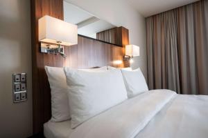Voodi või voodid majutusasutuse Radisson Blu Conference Hotel, Düsseldorf toas