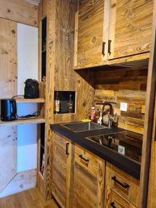 Kuchyň nebo kuchyňský kout v ubytování Appartement Bristol Villars-sur-Ollon + 3 fotografie
