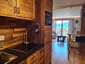 Kuchyň nebo kuchyňský kout v ubytování Appartement Bristol Villars-sur-Ollon