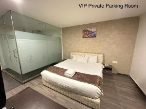 Postel nebo postele na pokoji v ubytování I Garden Hotel