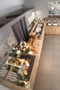 a buffet line with many plates of food at Hotel Le Golfe in Cassis