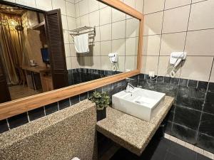Koupelna v ubytování I Garden Hotel