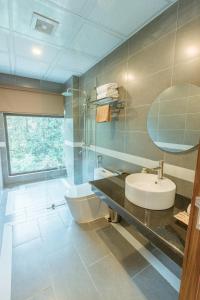 Koupelna v ubytování Sapa Yen Hotel + 37 fotografií