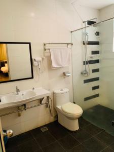Koupelna v ubytování I Garden Hotel