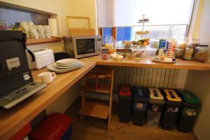 Eldhús eða eldhúskrókur á CJA Guesthouse