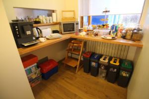 Eldhús eða eldhúskrókur á CJA Guesthouse
