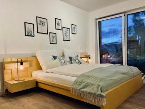 Postel nebo postele na pokoji v ubytování 3Zi-Barrierefrei-Zentral-Komfort
