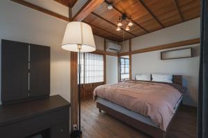 Voodi või voodid majutusasutuse 城下の宿　燈 toas
