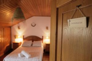 Posteľ alebo postele v izbe v ubytovaní Apartamento turístico "A Fonte Dos Xudíos"