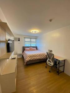 Llit o llits en una habitació de Penthouse at Portovita Towers