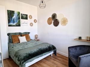 Ένα ή περισσότερα κρεβάτια σε δωμάτιο στο Appartement Dunkerque
