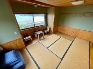 Posezení v ubytování 大砂荘 OZUNA CAMP and LODGE