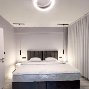 Un pat sau paturi într-o cameră la Galata Inn Hotel