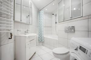 Kúpeľňa v ubytovaní Central Apartments by Tyzenhauz