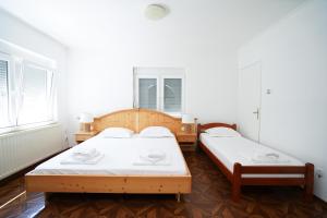 Postel nebo postele na pokoji v ubytování Kuća za odmor DUNJA + 33 fotografií