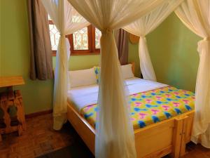 Giường trong phòng chung tại Airport Link Guest House