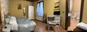 TV a/nebo společenská místnost v ubytování B&B Il Rifugio