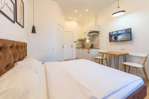 Katil atau katil-katil dalam bilik di Idea Design Apart-Hotel Chykalenka