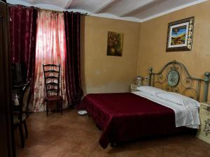 Postel nebo postele na pokoji v ubytování B&B Il Rifugio