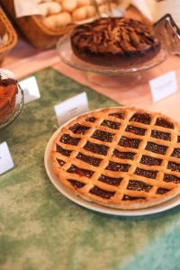 a pie sitting on top of a table with at Hotel Esperia in Genoa
