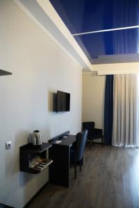 TV a/nebo společenská místnost v ubytování Hotel Panoramic
