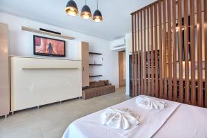 En eller flere senge i et værelse på Studio Panoramic Sea On