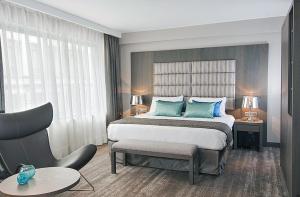 Postel nebo postele na pokoji v ubytování Hotel Agenda Louise