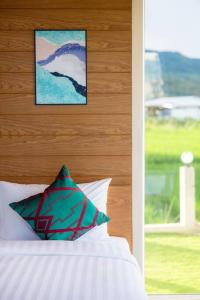 Vann House Chiang Rai- near Mae Fah Luang University客房内的一张或多张床位