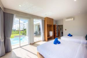 Vann House Chiang Rai- near Mae Fah Luang University客房内的一张或多张床位