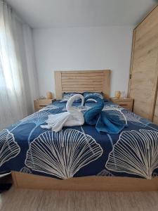 Postel nebo postele na pokoji v ubytování Résidence Maëlla