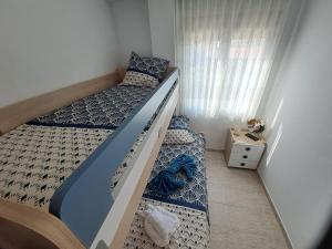 Postel nebo postele na pokoji v ubytování Résidence Maëlla
