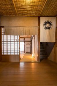 Postel nebo postele na pokoji v ubytování 深山邸miyama-teiの一棟貸し